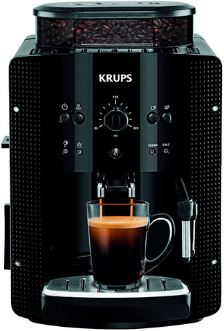 Cafetera express negra de la marca Krups sirviendo un café